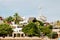 Dhows and boats moored at shore against buildings in Shela Beach, Lamu Island, Kenya