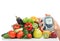 Diabetes concept glucose meter fruits and vegetables