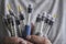 Diabetes insulin dependent concept, hands with syringes pen injectors with doses of humalog for subcutaneous abdomen injection