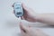 Diabetes patients use a sugar glucose meter to measure their blood glucose levels at home