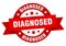 diagnosed round ribbon isolated label. diagnosed sign.
