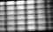 Diagonal black and white grid bokeh background