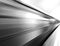 Diagonal black and white motion blur metro train background