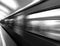 Diagonal black and white motion blur metro train background