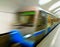 Diagonal blue motion blur metro train background