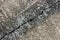 Diagonal crack in concrete - rough cement texture