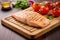 diagonal lined grill marked salmon steak on a wooden board