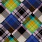 Diagonal madras patchwork plaid cotton pattern. Seamless quilting fabric effect linen check background.