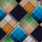 Diagonal madras patchwork plaid cotton pattern. Seamless quilting fabric effect linen check background.