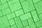 Diagonal pavement pattern toned in bright green