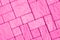 Diagonal pavement pattern toned in bright pink