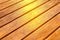 Diagonal wood surface texture with sunlight brown planks table background