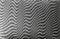 Diagonal zigzag wavy linear texture with moire effect.