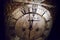 Dial of an antique antique english grandfather clock, filtered with grain and scratches