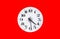 Dial watch on a red background. Old vintage clock face