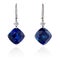 Diamond and blue sapphire earrings.