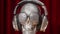 Diamond covered skull with headphones and sunglasses rotating