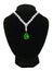 Diamond and emerald necklace on black mannequin