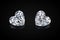 Diamond isolated on black background. Luxury colorless transparent sparkling gemstone diamond heart shape cut