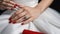 Diamond ring on the hand of a young woman, close-up