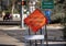 A diamond shaped road sign advising motorcyle riders to use extreme caution