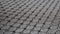Diamond woven Black carbon fiber composite material background close up view