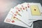 Diamonds royal flush playing cards poker combination on grey background