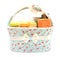 Diapers milk bottle and flask in basket