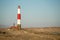 Diaz Point lighthouse in Luderitz town Namibia against the blue sky during the daytime
