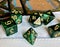 Dice game green polyhedral, MTG dice and cards.