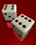 Dice on red surface