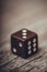 Dice on table, vintage effect. Background for casino games, gambling, luck or randomness. Rolling the dice concept for business