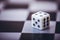 Dice on table, vintage effect. Background for casino games, gambling, luck or randomness. Rolling the dice concept for business