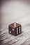 Dice on table, vintage effect. Background for casino games, gambling, luck or randomness. Rolling the dice concept for business