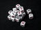 Dices on black background