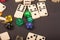 Dices and dominoes  game on a black background