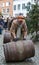 Dickens festival people roll with barrels Christmas carol