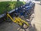 Didi and OFO shared bikes on the side of the road in day time-sharing is very popular in