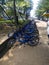 Didi shared bikes on the side of the road in day time-sharing is very popular in China.