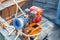 A diesel engine with a rope for raising and lowering a ship`s anchor on the deck of a fishing boat