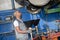 Diesel mechanic inspecting vehicle