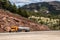 Diesel semi trailer truck on highway in rocky mountains