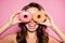 Diet, calories, healthcare, willpower, summer, body care, concept. Close up portrait of happy cute girl with sweet donuts like sp