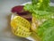 Diet concept, healthy eating, lettuce, cauliflower, eggplant, measuring tape vegetables