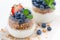 diet dessert with yogurt, granola and fresh berries, close-up
