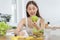 Diet, Dieting asian young woman working, write diet plan right nutrition, hold green apple, vegetables salad is food for good