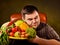 Diet fat man eating healthy food. Healthy breakfast with vegetables.