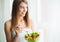 Diet and health.Young woman eating healthy food after workout