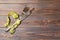 Diet and healthy eating concept with crossed fork and knife and measuring tape on wooden background. Top view of weightloss