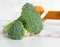 Diet healthy eating weight control concept. Closeup green broccoli measuring tape